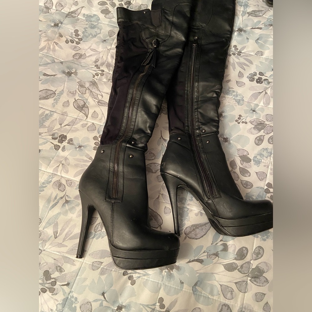 Thigh high black stiletto boot